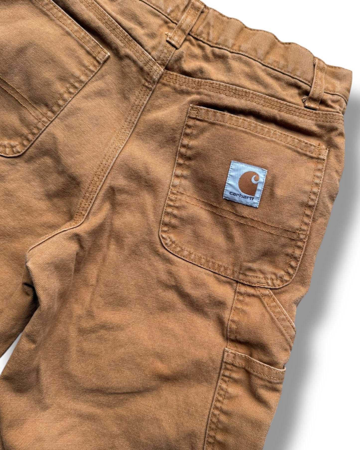 Carhartt carpenter jeans in tan with checked lining